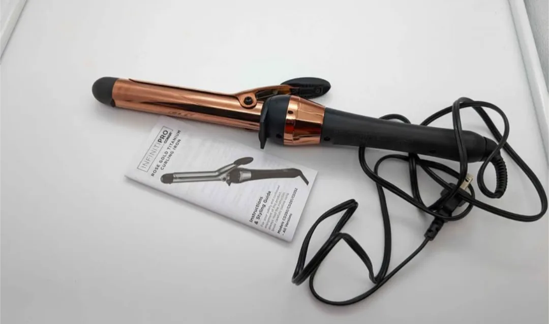 The Pro Infiniti Pro 1 inch Rose Gold Titanium Curling Iron image indicator(4)