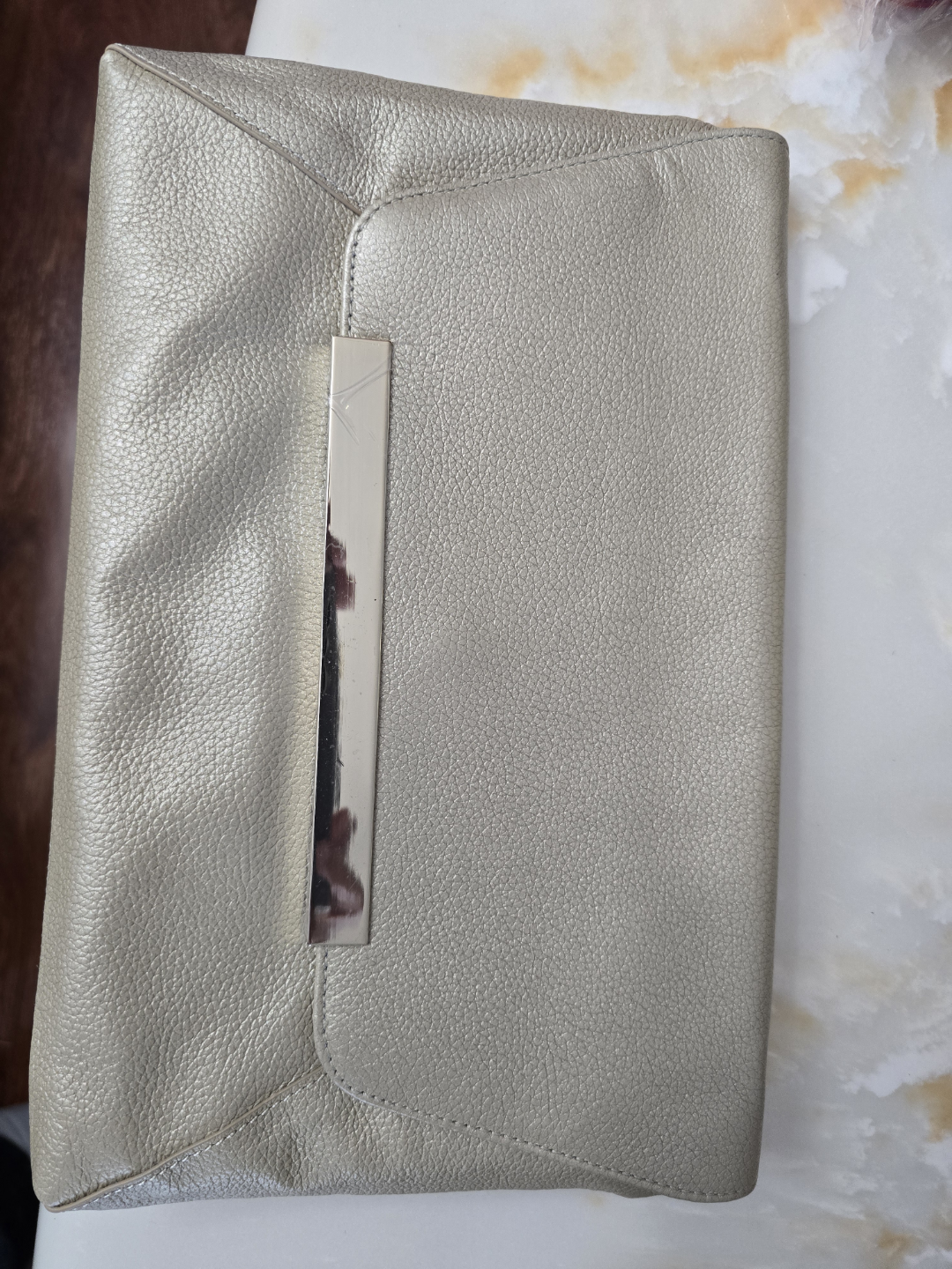 Danier Gold Leather Clutch