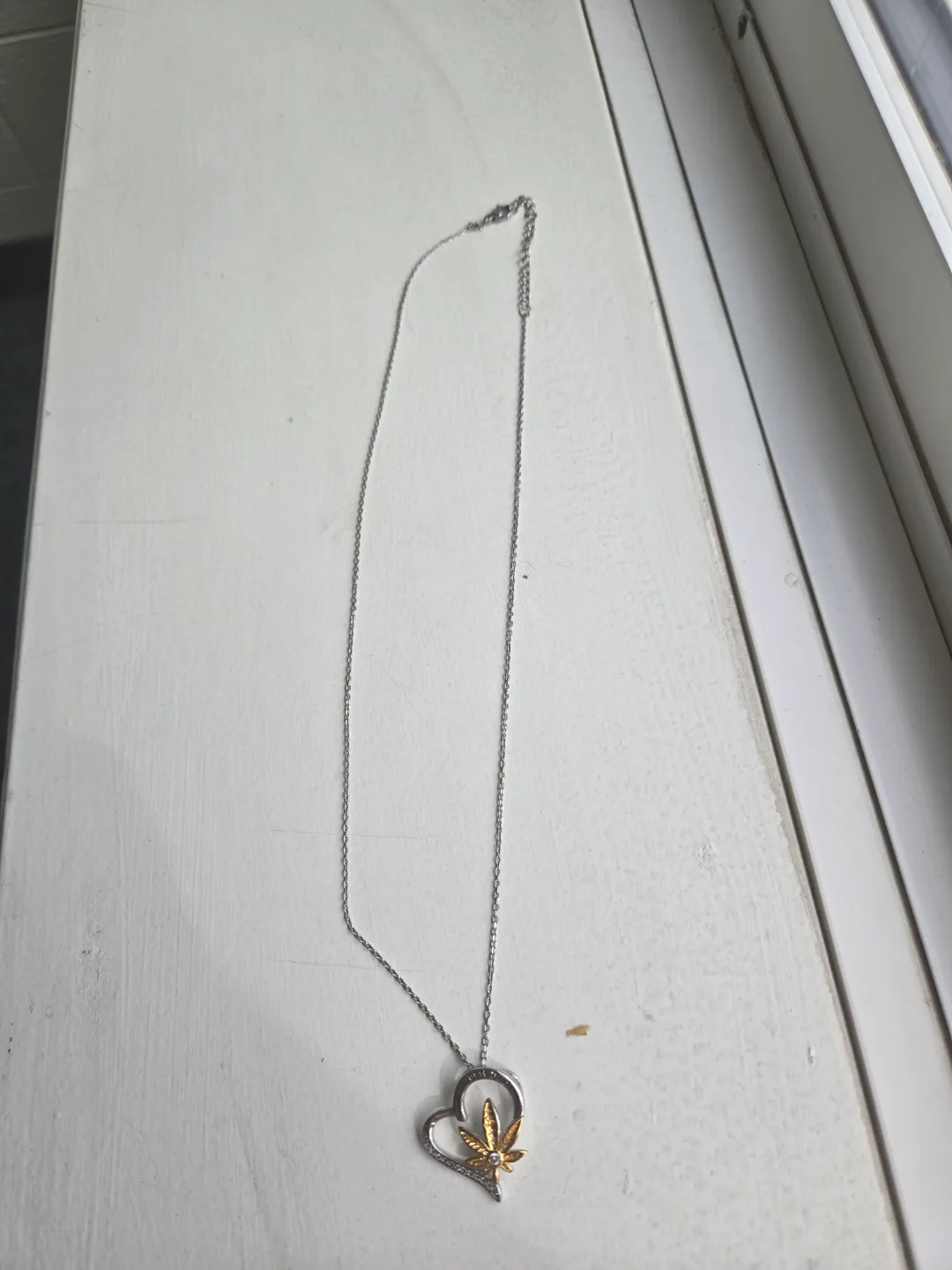 Silver and Gold Heart Cannabis Leaf Necklace thumbnail