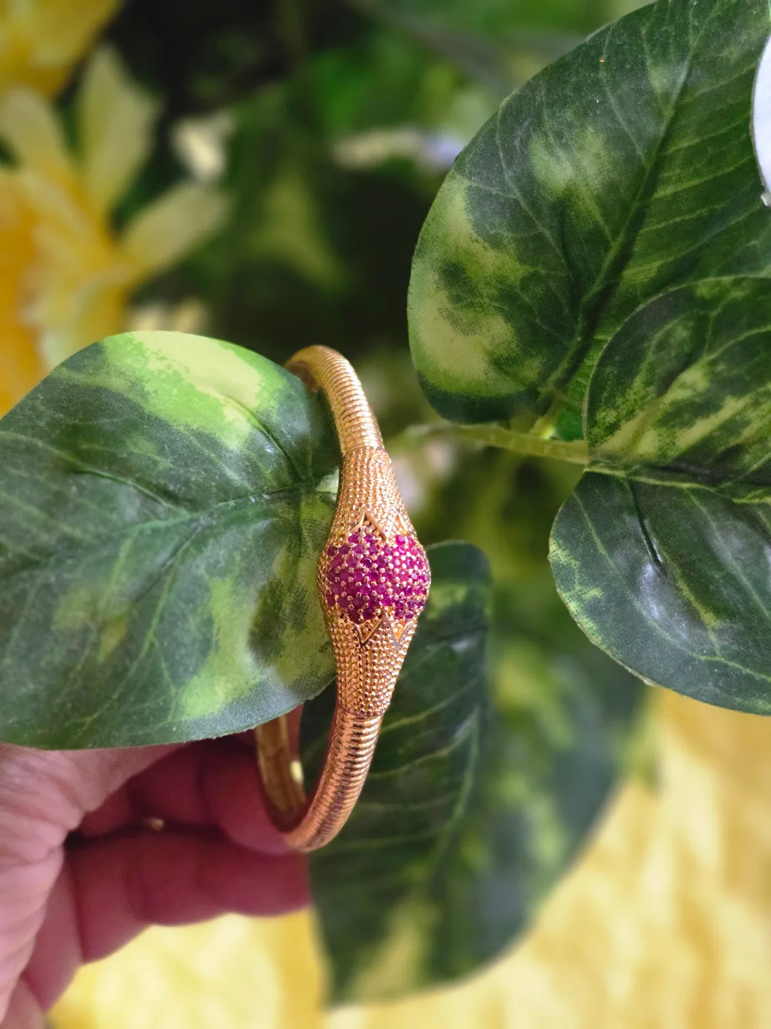 Gold-toned Snake Bracelet with Pink Stones thumbnail