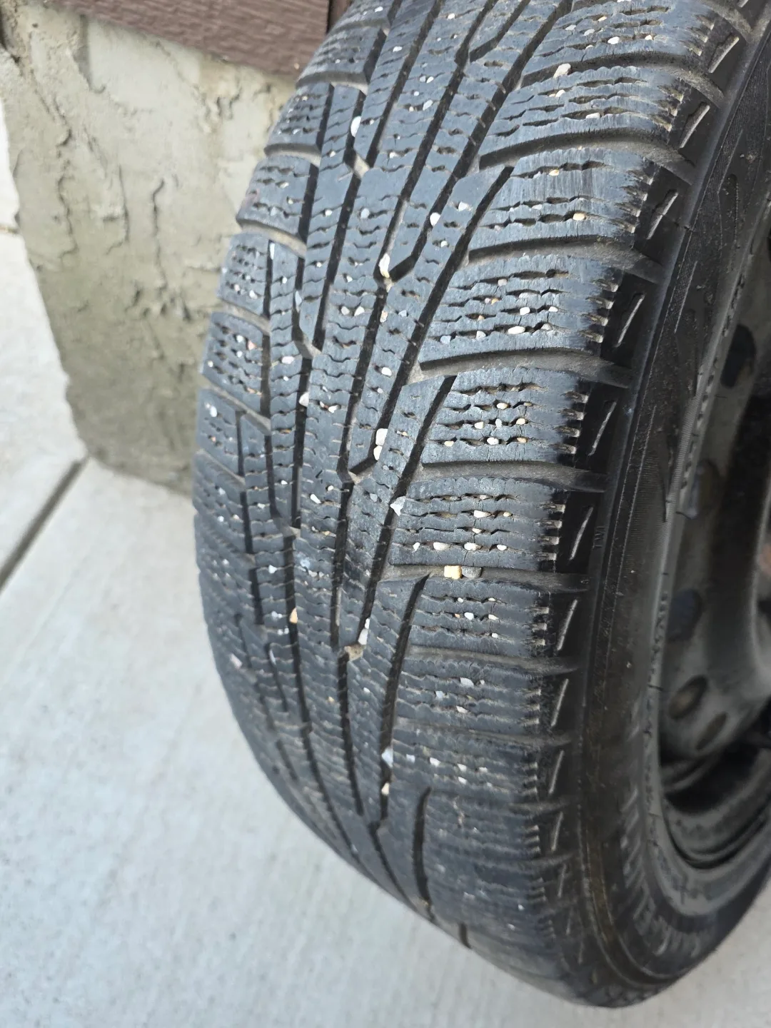 Four Used Nokian Hakkapeliitta R2 Winter Tires on Steel Rims image indicator(8)