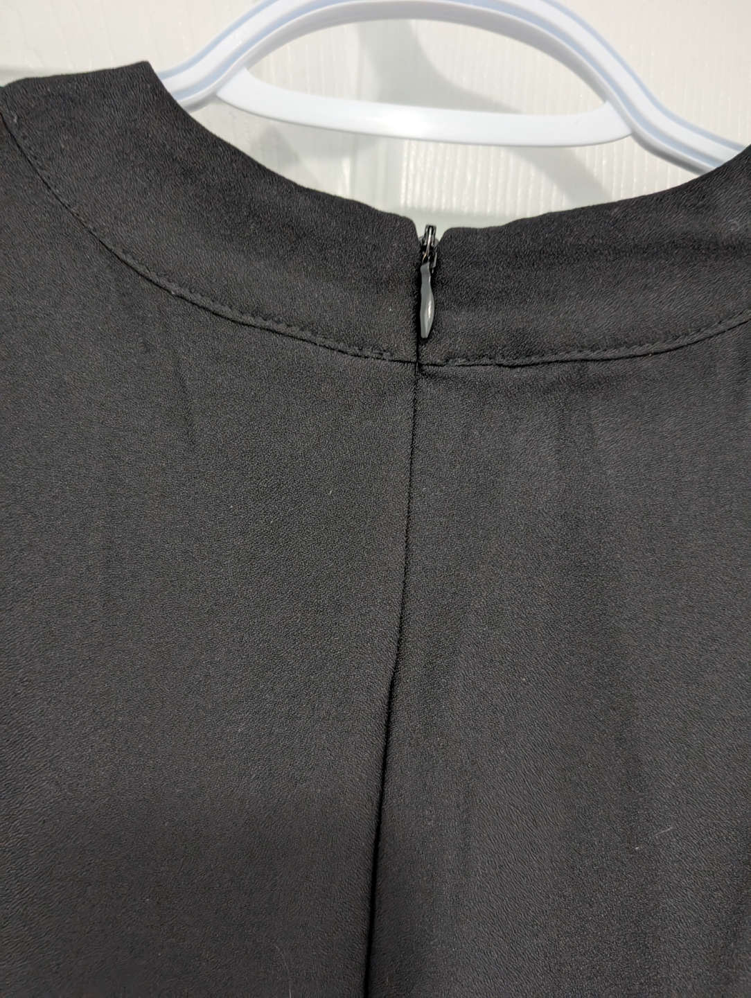 Black V-Neck Jumpsuit with Subtle Ruffle Sleeves - photo 5