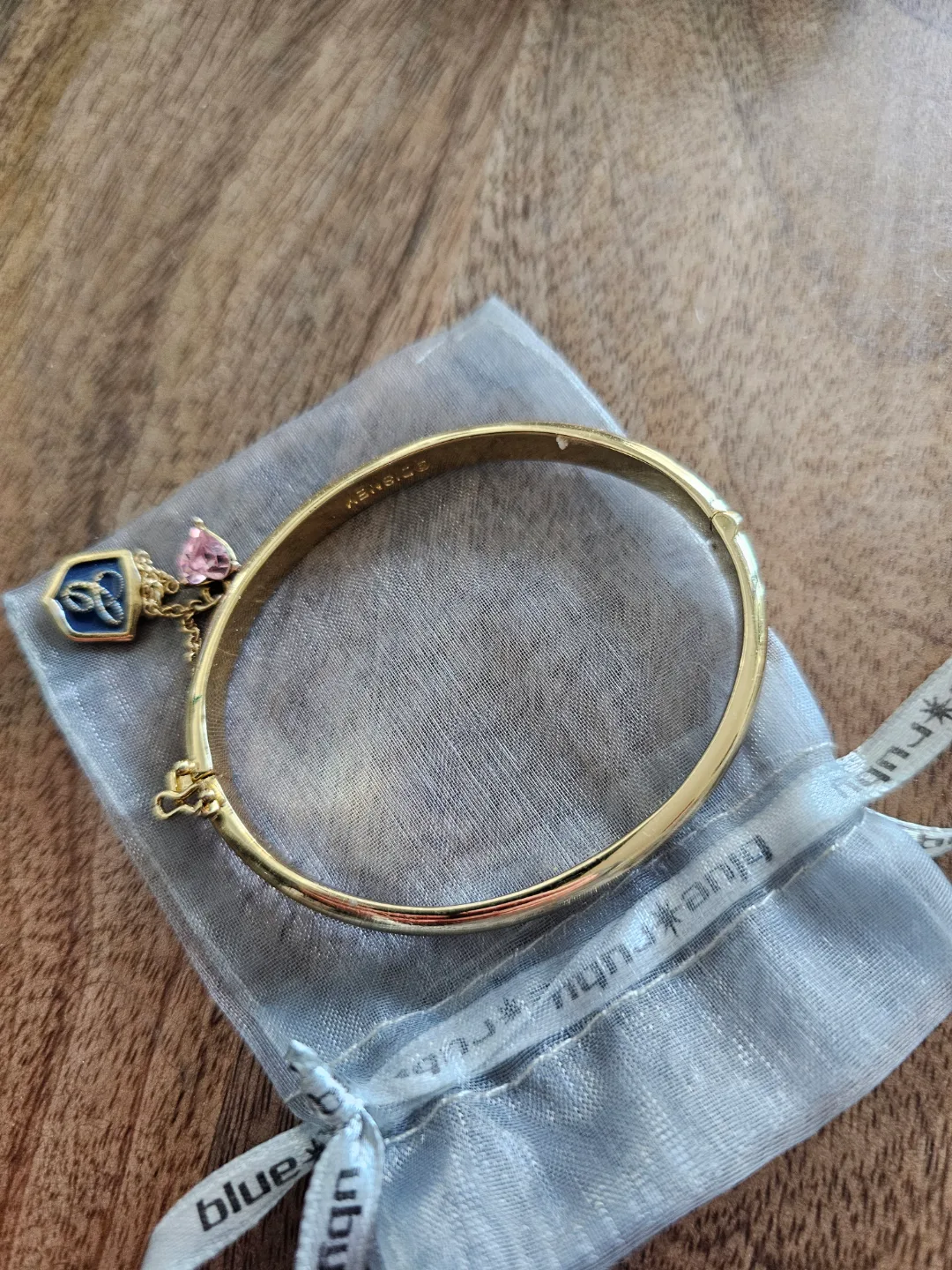 Collectable Disney bangle bracelet with charms and inscription image indicator(2)