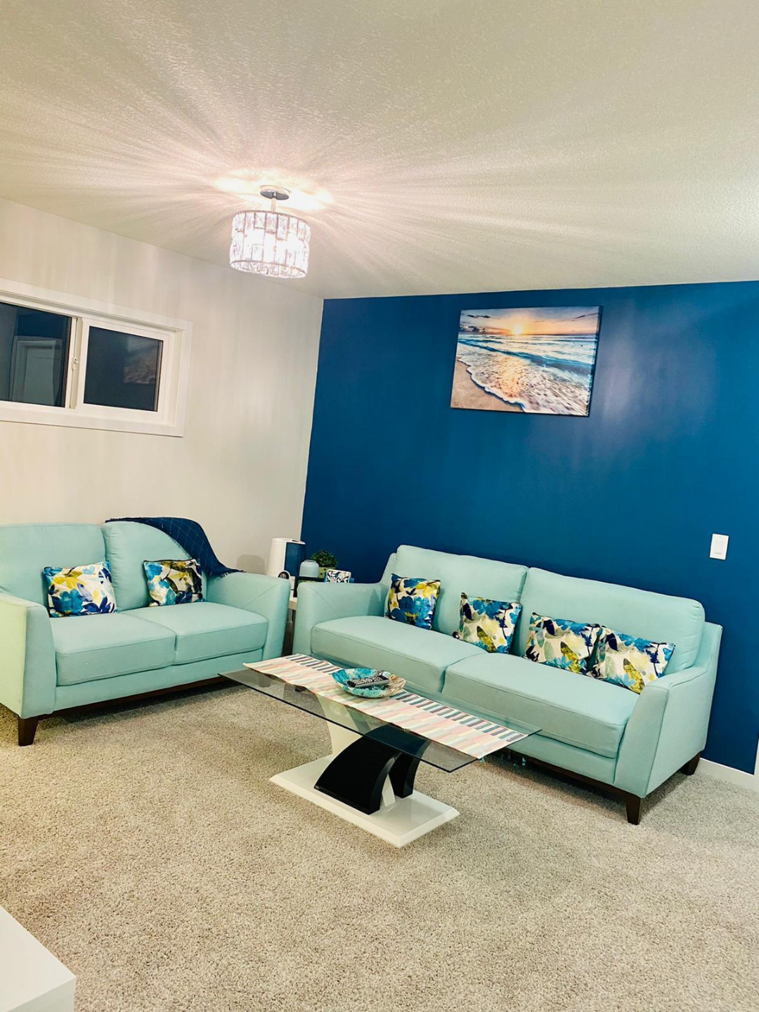 Pair of Mint Green Sofas with coffee table