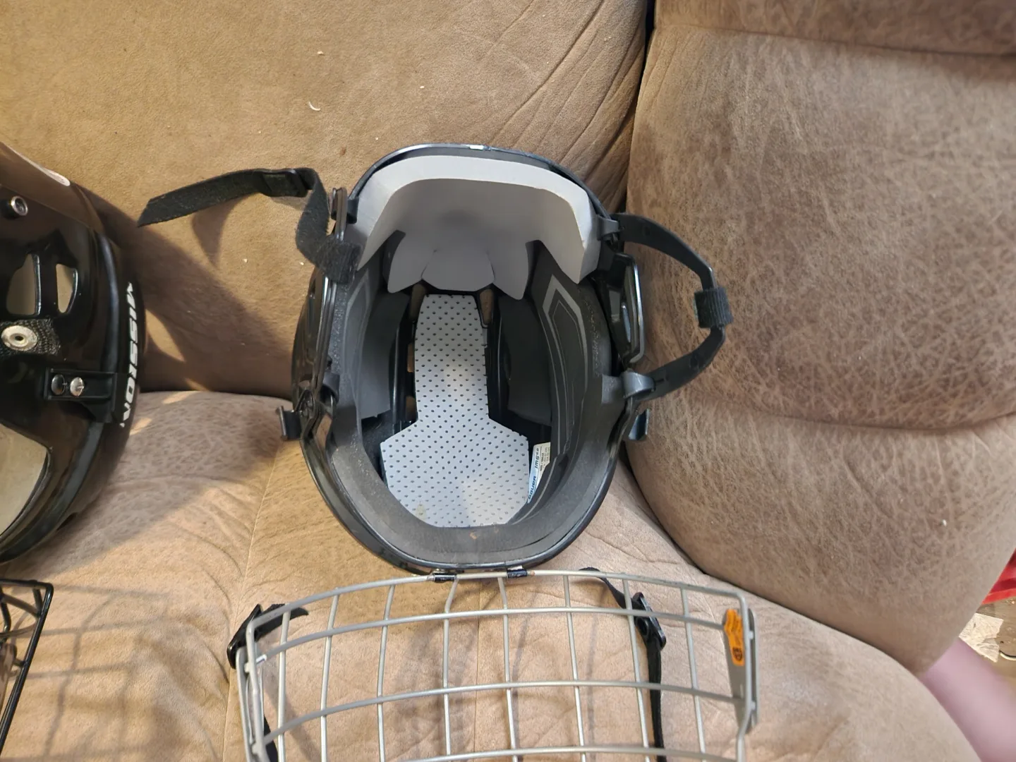 Two Used CCM Hockey Helmets with Cages image indicator(3)