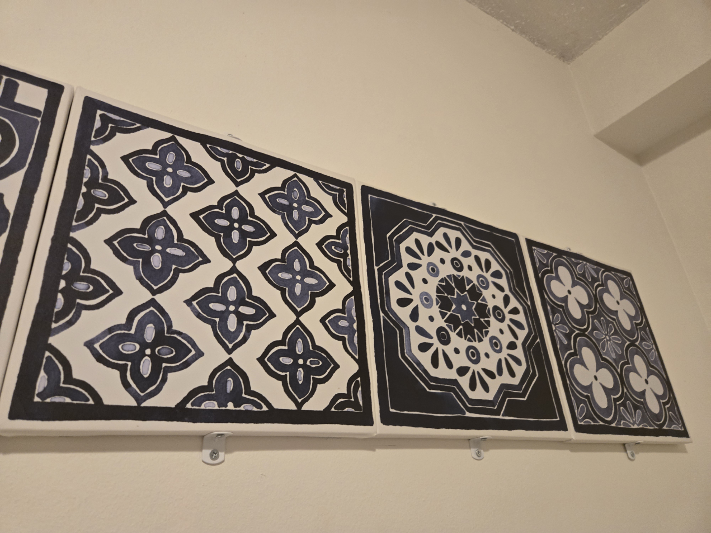 Set of Four Blue and White Patterned Wall Tiles