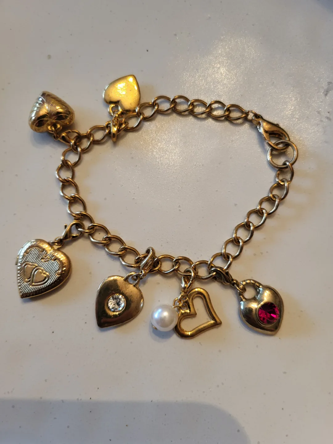 Gold Charm Bracelet with Heart Pendants thumbnail