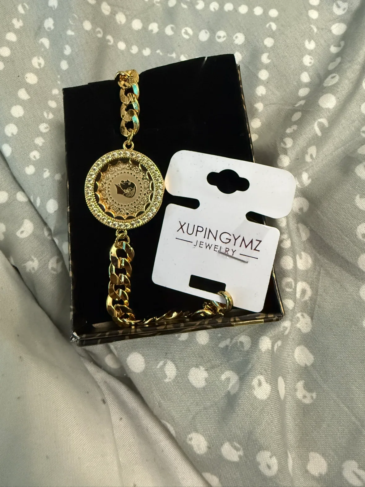 Gold Cuban Link Bracelet with Coin Charm image indicator(2)