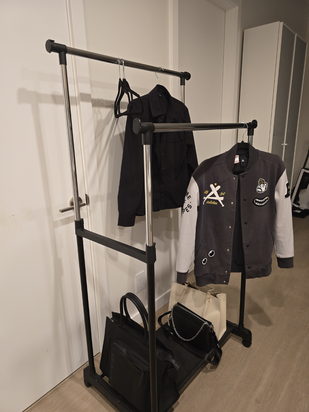 Double Clothing Rack with Wheels