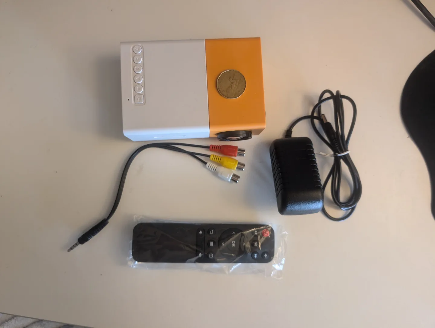 🧡 Mini Portable Projector with Remote image indicator(2)