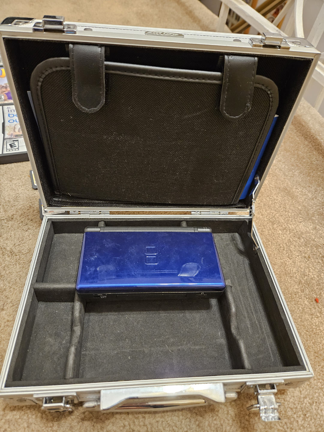 Nintendo DS console, case and games