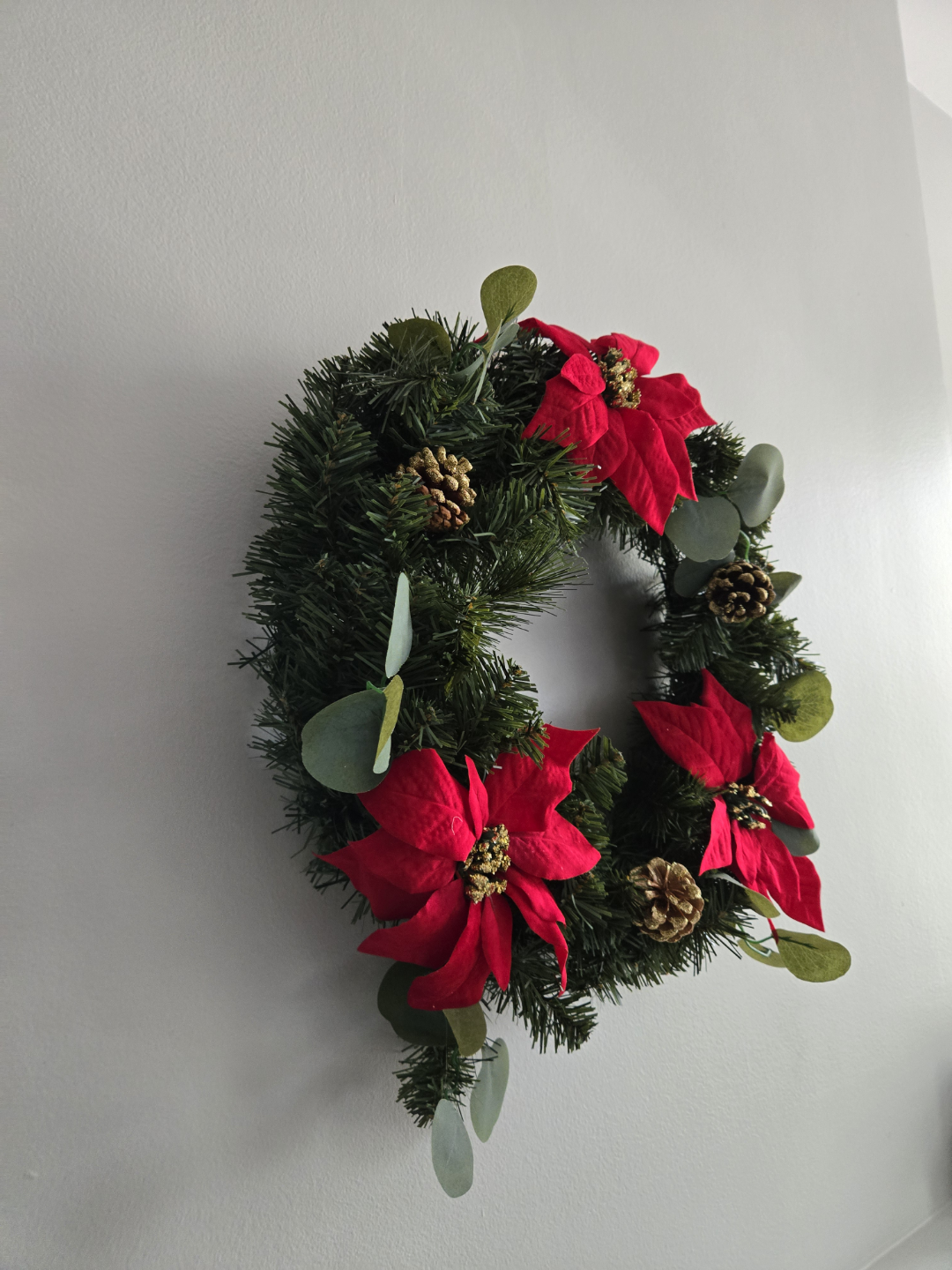 Christmas Wreath with Red Poinsettia and Pine Cones - photo 2