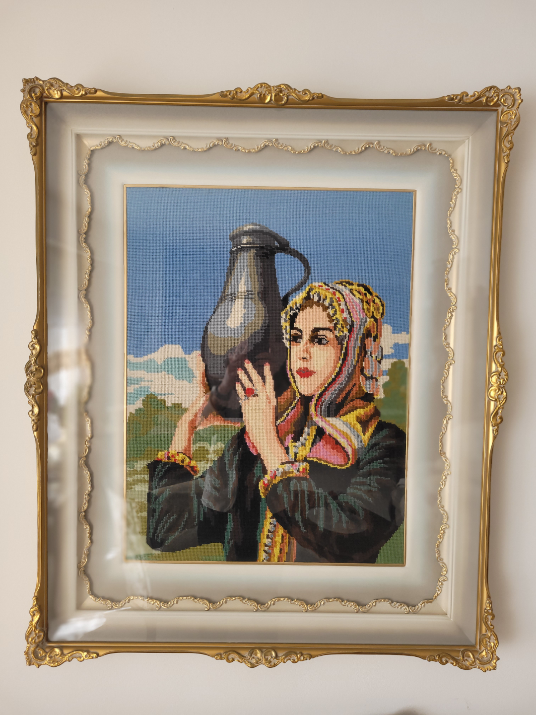 Framed Needlepoint Embroidery of Woman with Pitcher
