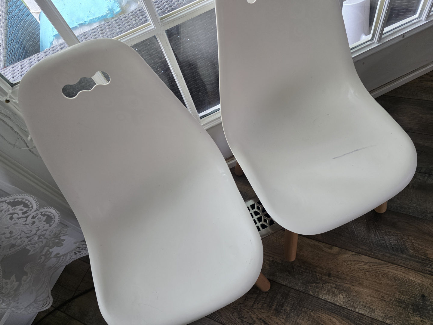 Pair of White Plastic Chairs with Light Wood Legs