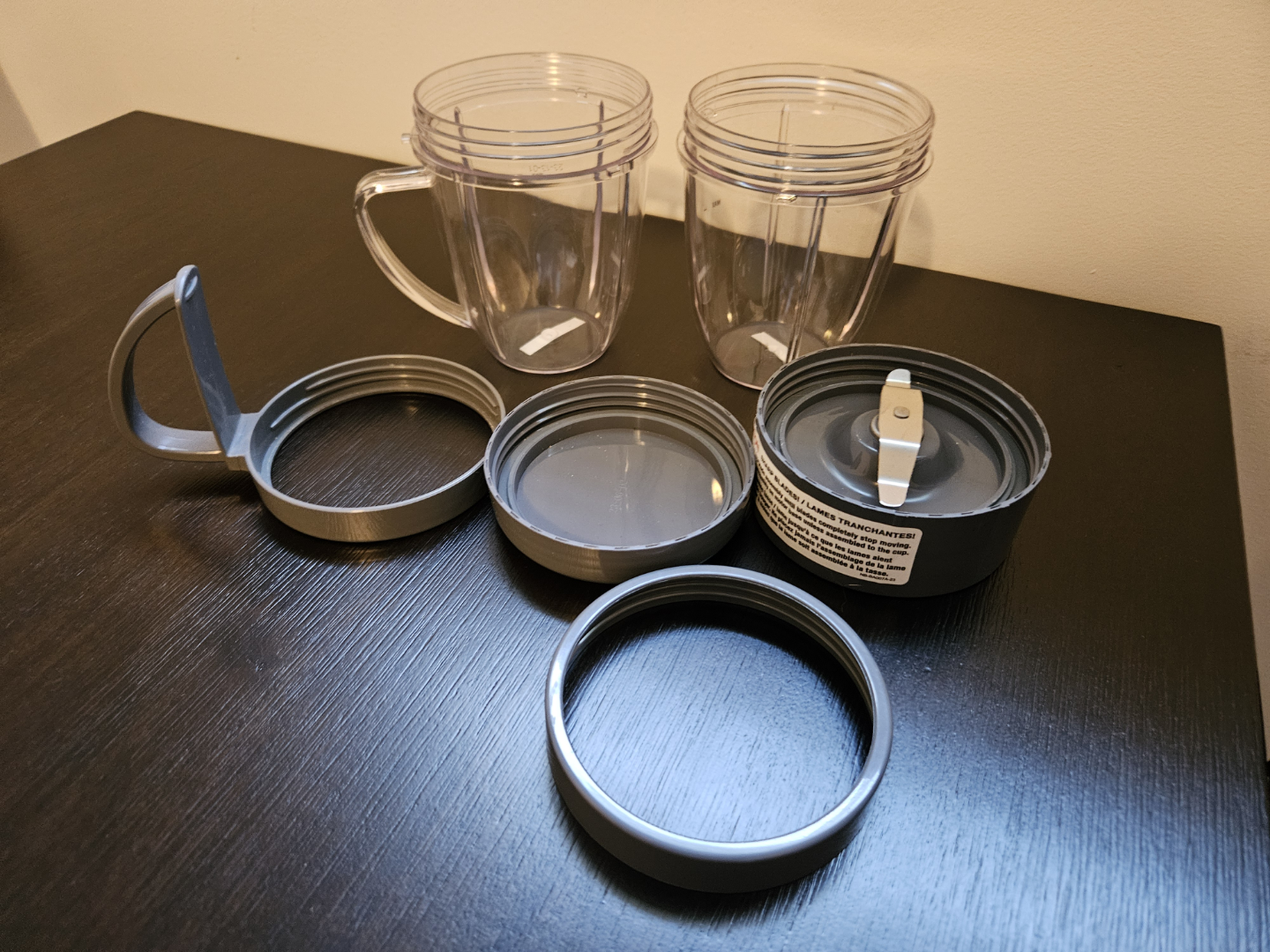 Two NutriBullet 600 watt Cups with Lids and Blades 🧡