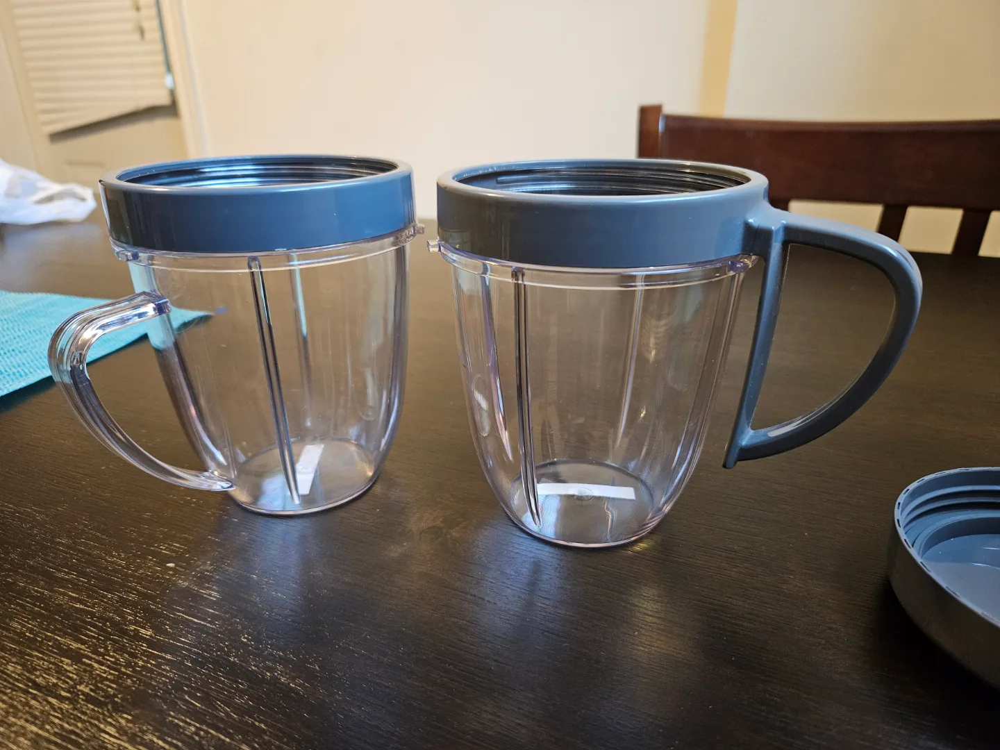 Two NutriBullet 600 watt Cups with Lids and Blades 🧡 image indicator(2)