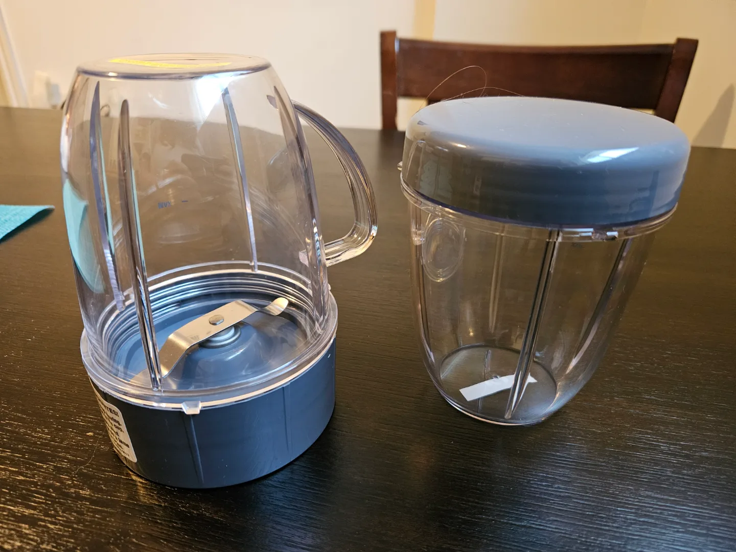 Two NutriBullet 600 watt Cups with Lids and Blades 🧡 image indicator(3)