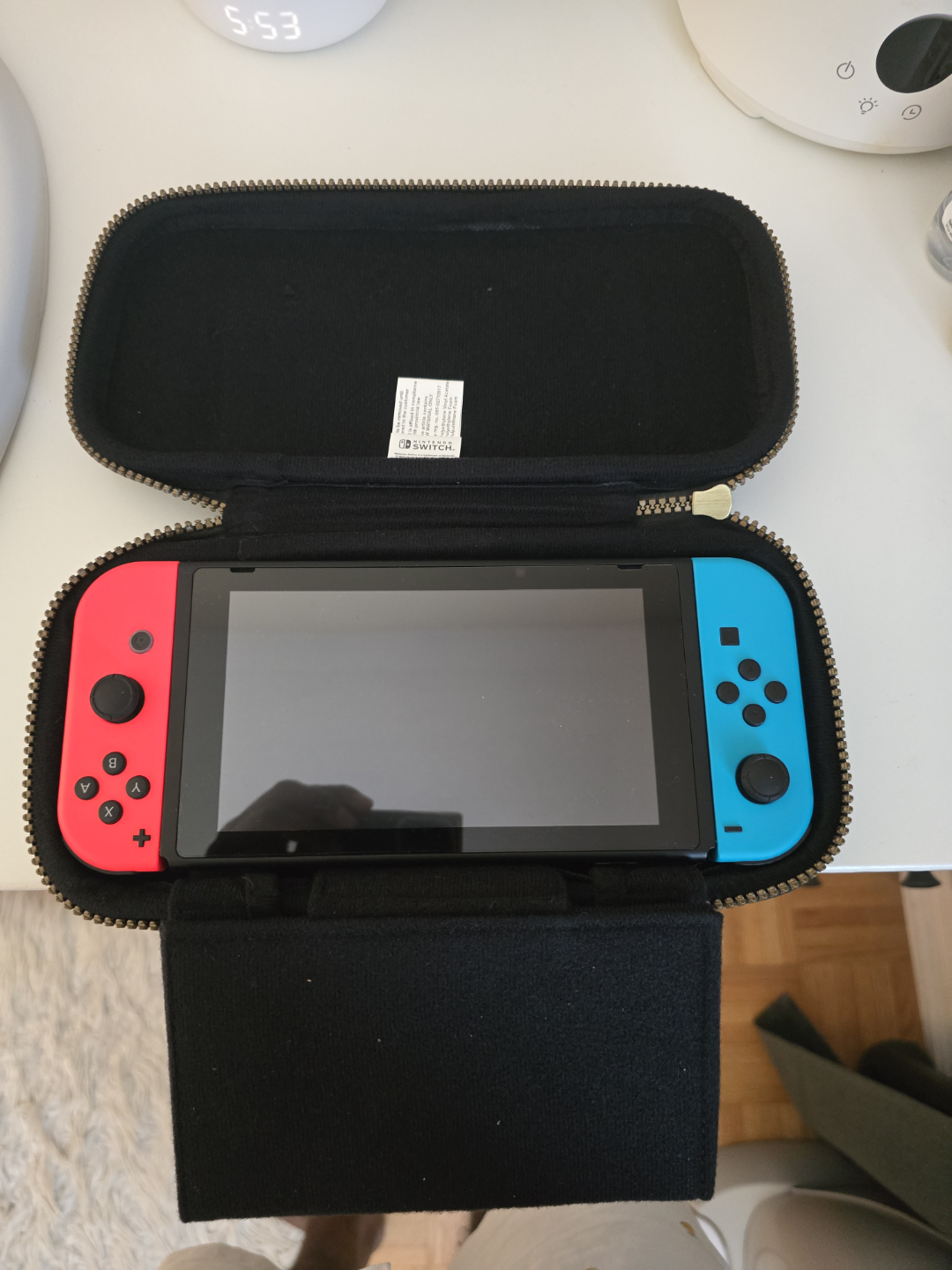Nintendo Switch with Breath of the Wild Case and Four Games