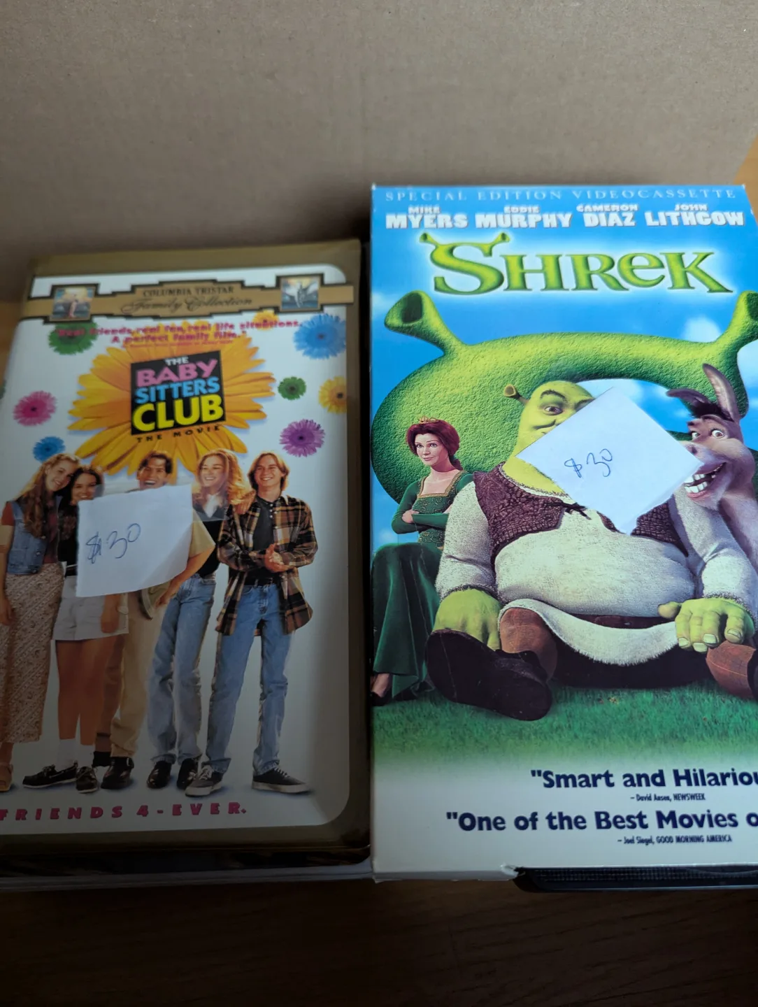 Pair of VHS tapes: The Baby-Sitters Club & Shrek thumbnail