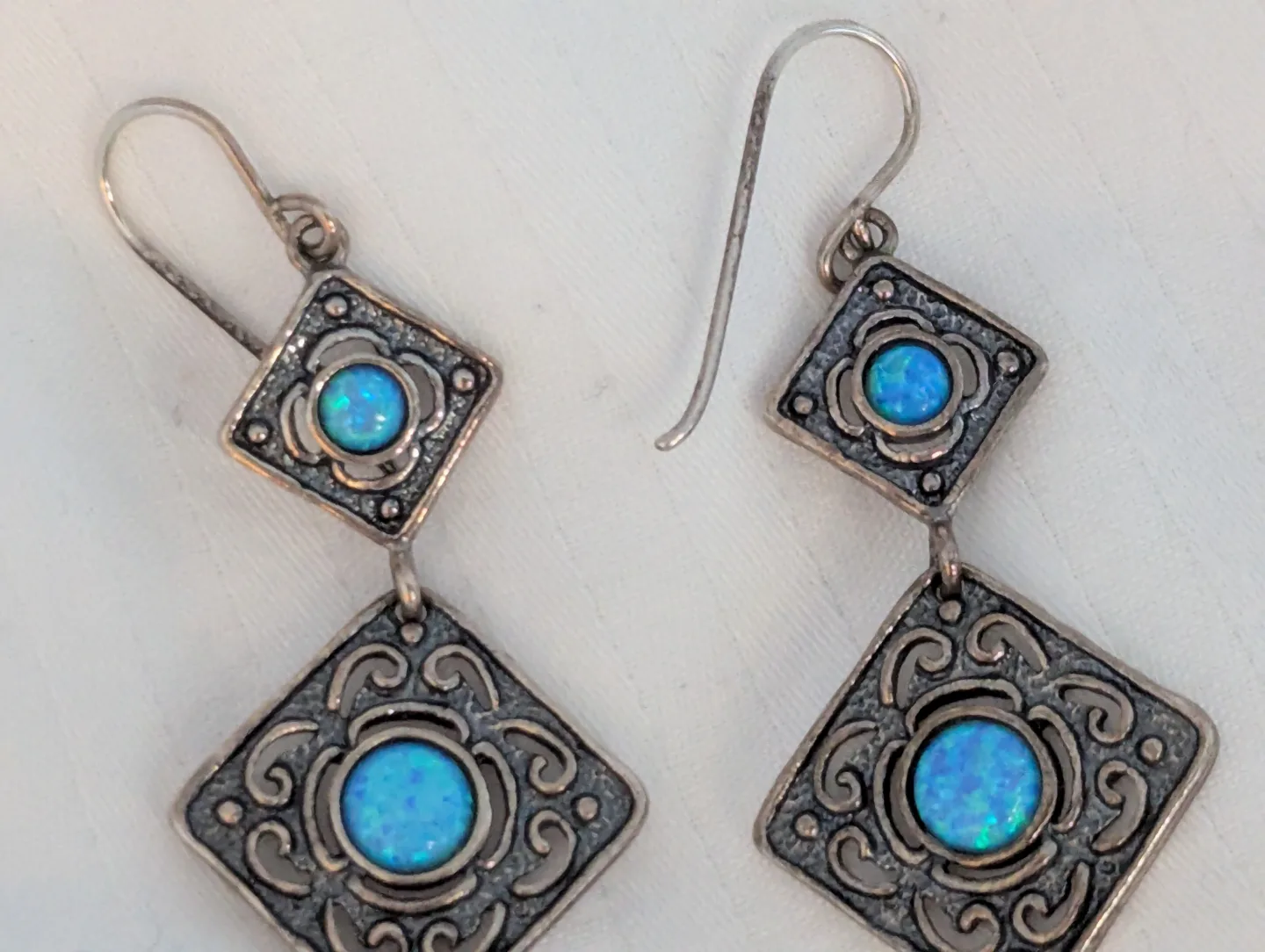 Stunning blue opals set in 925 silver dangle Earrings image indicator(9)