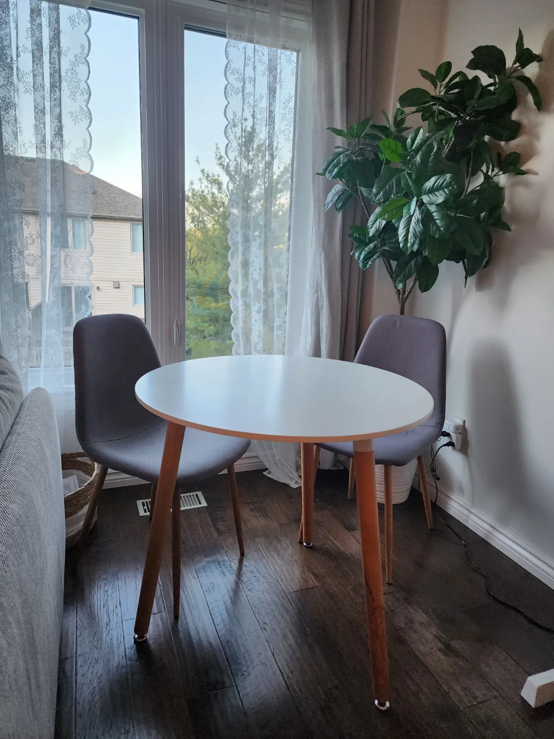 Round White Table and Two Grey Chairs thumbnail