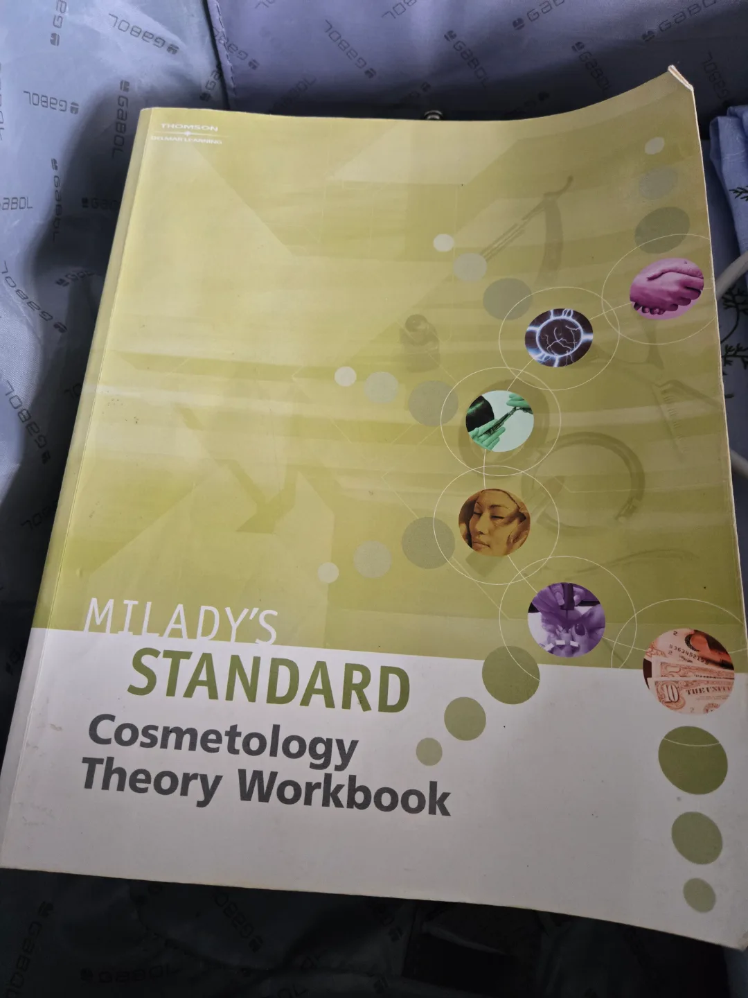 Milady's Standard Cosmetology Textbook & Workbook image indicator(2)