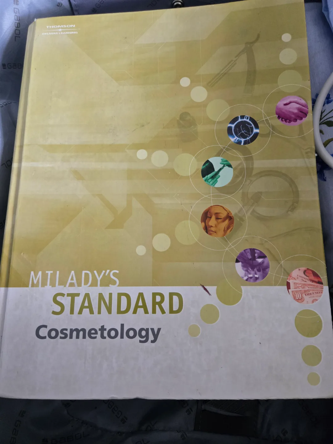 Milady's Standard Cosmetology Textbook & Workbook image indicator(3)