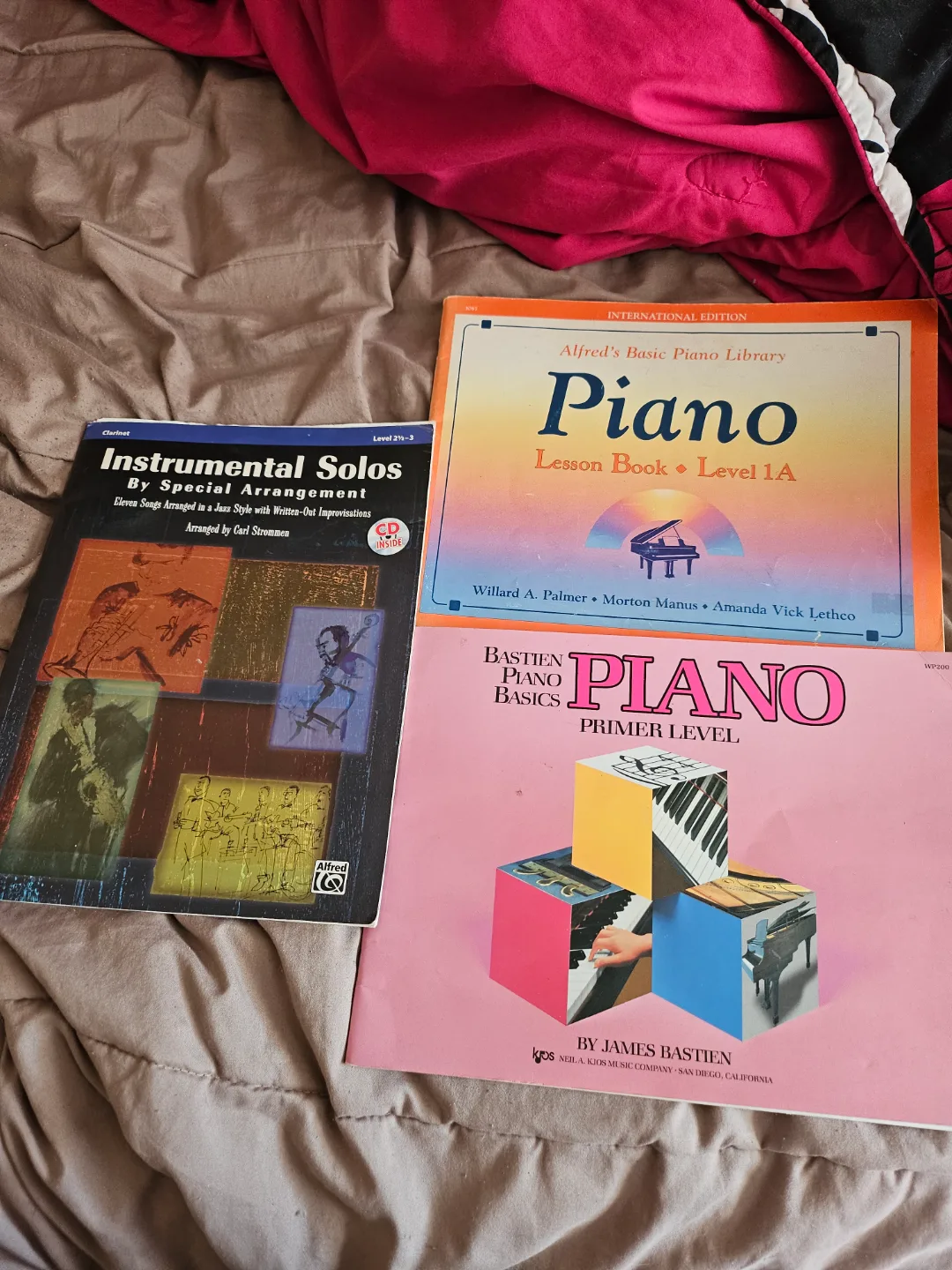 1 clarinet book and 2 piano books thumbnail