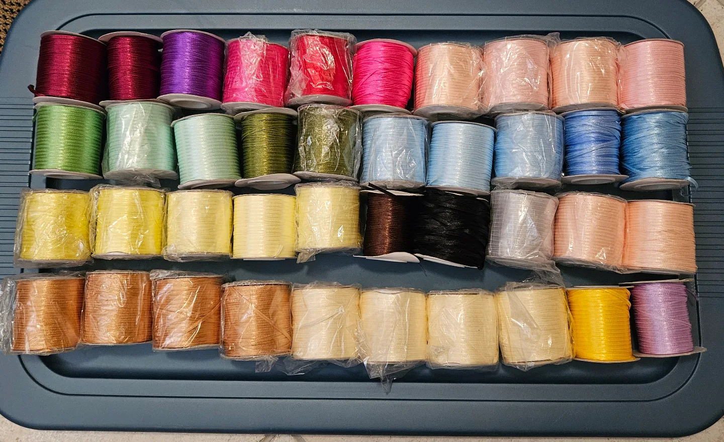 Assorted colours of ribbon spools thumbnail