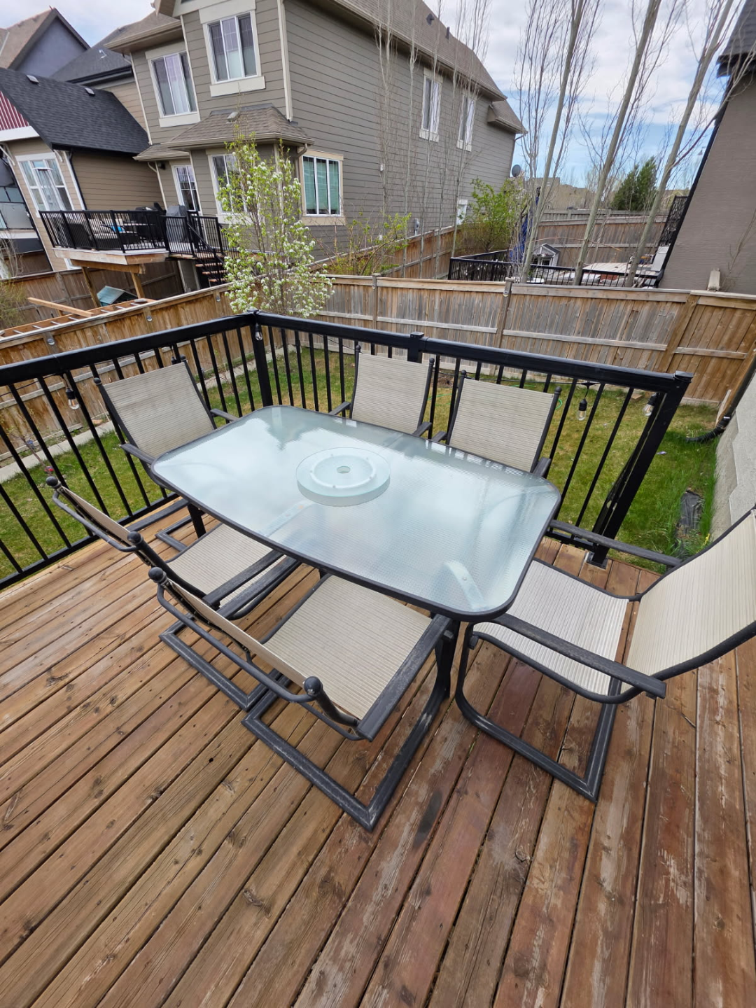 Patio dining set - 6 chairs, glass top table