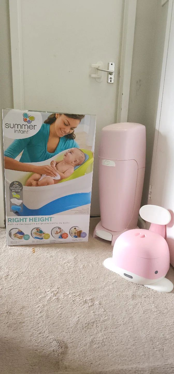 A baby bath tub, Diaper Pail and Potty Training Potty. thumbnail