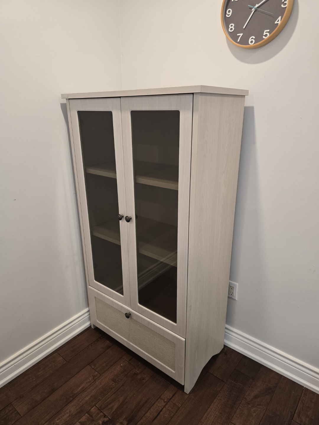 Wooden cabinet with glass doors