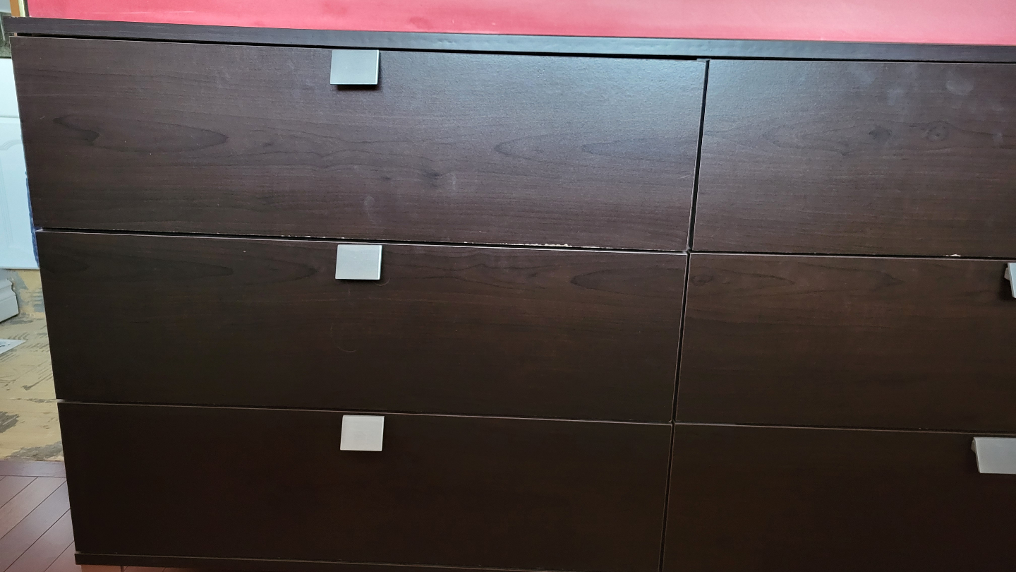 Dark brown six-drawer dresser