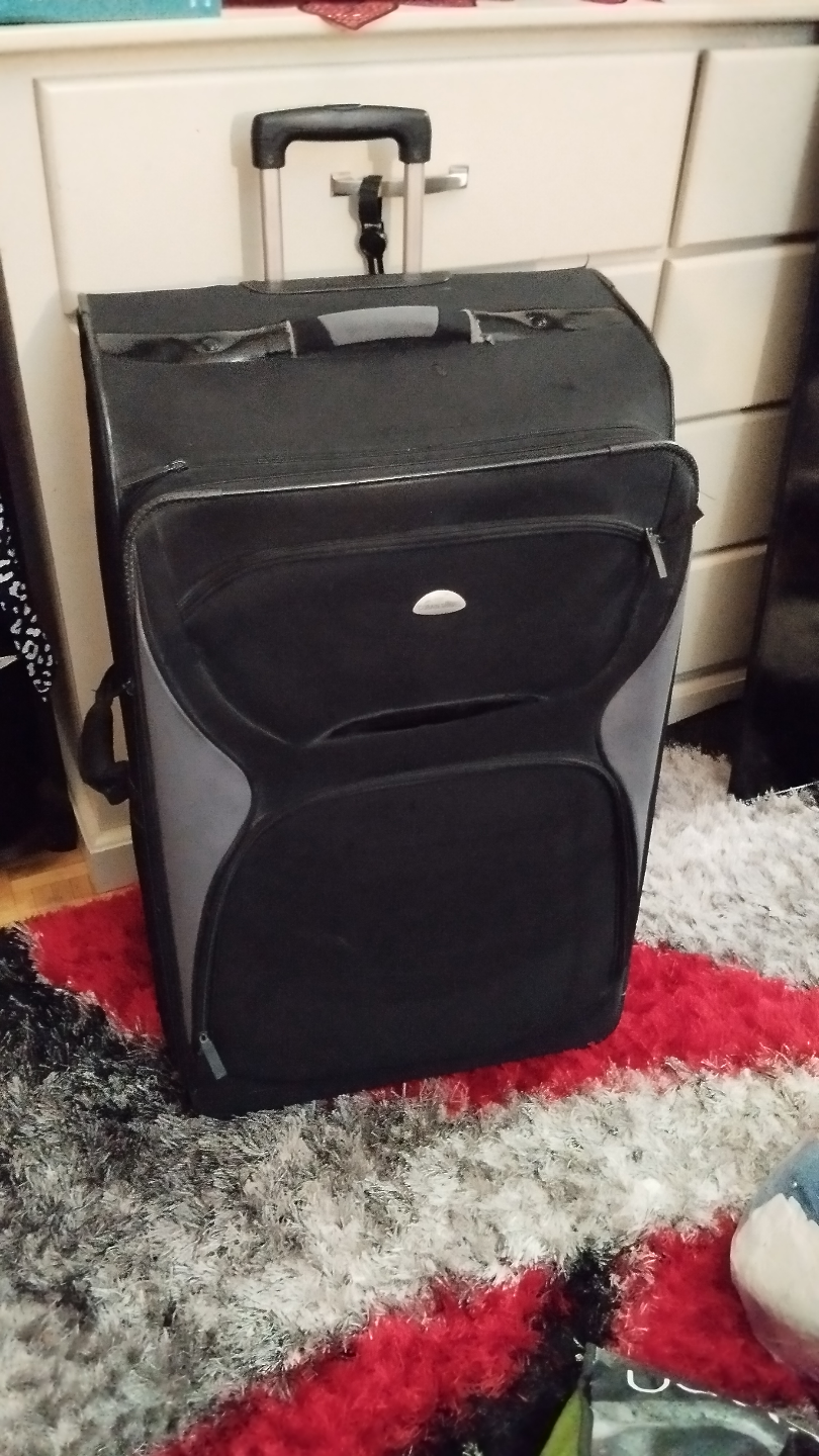 Large Black Samsonite Rolling Suitcase