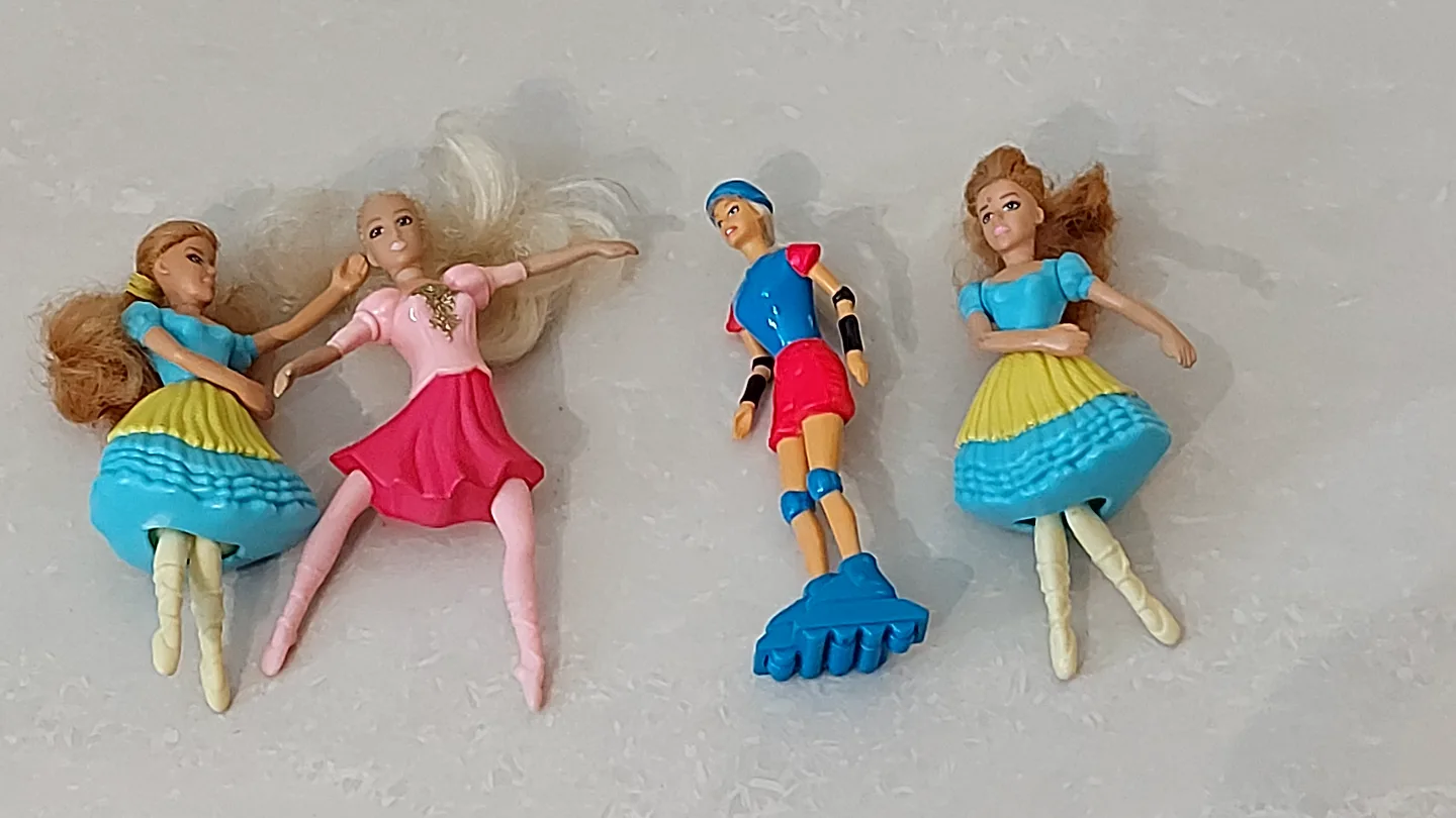 Four Barbie Toys thumbnail