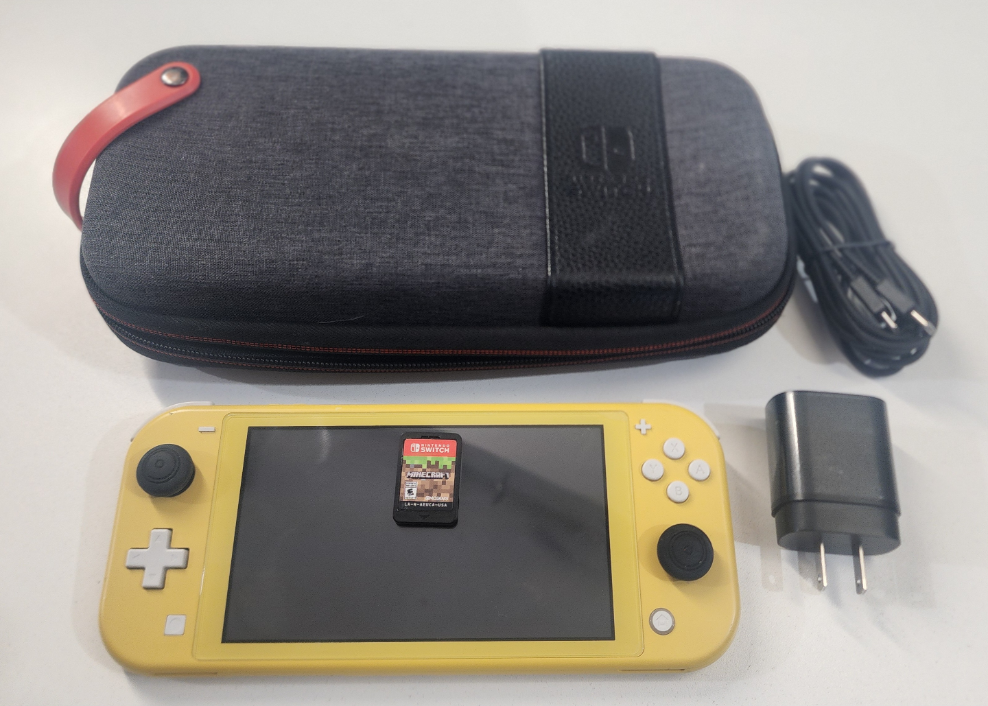 Yellow Nintendo Switch Lite with Minecraft, Case & Charger - photo 2