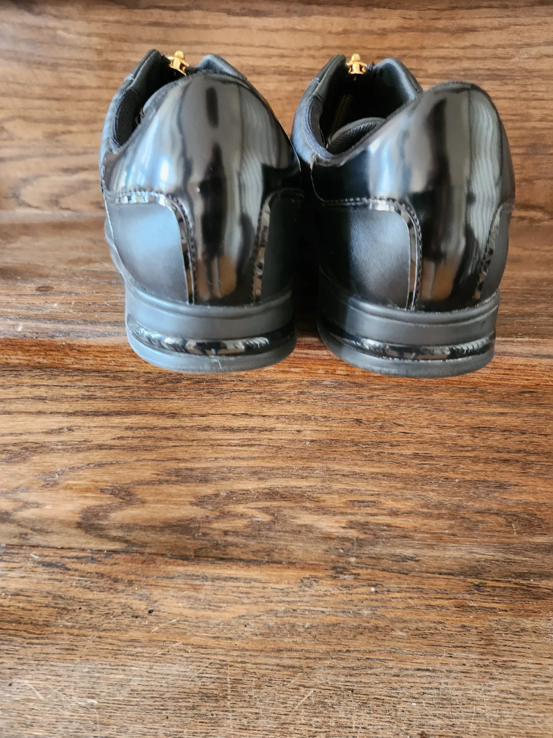 GeoX Women's Black Leather Zip-Up Sneakers. Size 10 image indicator(3)