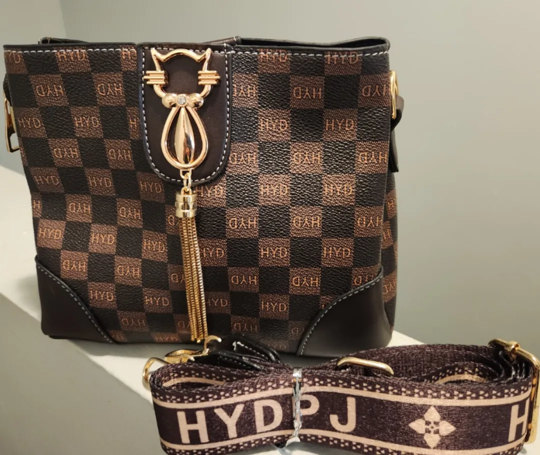 Stylish Brown Handbag with Adjustable Strap thumbnail