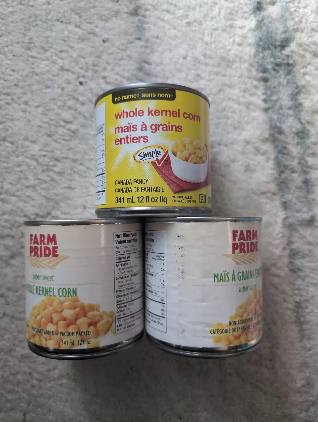 Three cans of whole kernel corn thumbnail