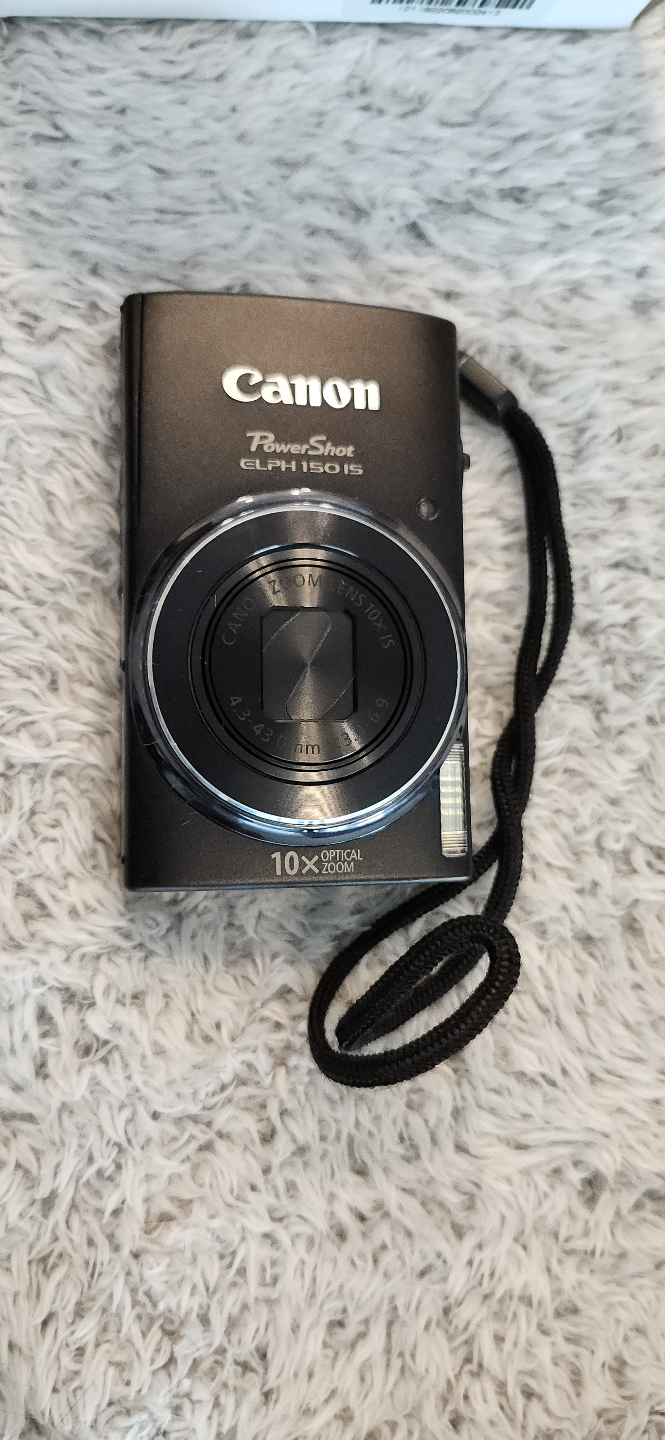 Barely used Canon Powershot ELPH 150 IS with lots of accessories