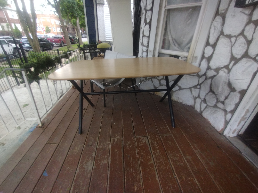 Wooden Table with black frame