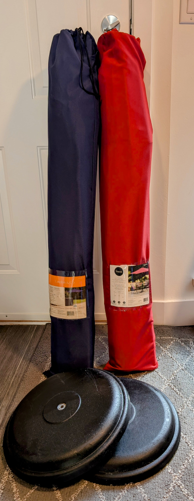 7.5ft diam patio umbrellas. red and blue.