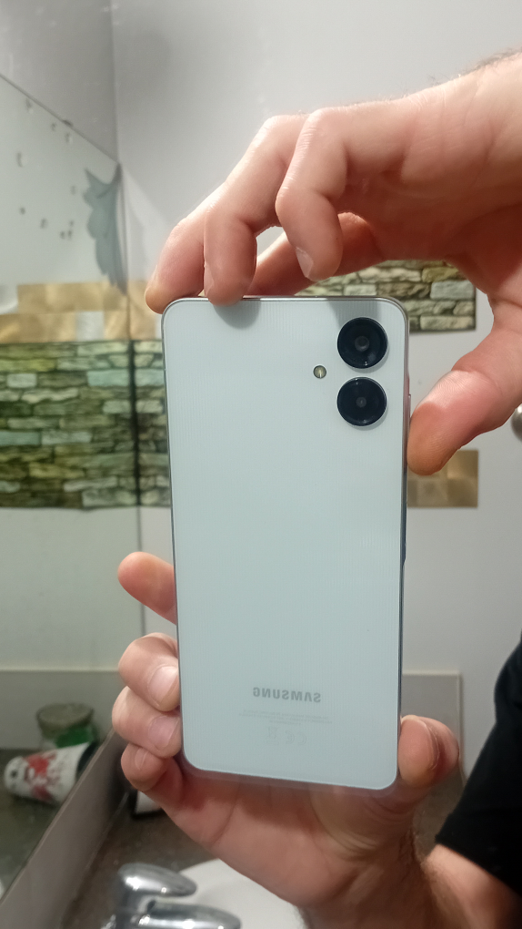 Samsung Galaxy A06  with case and screen Protector🥕