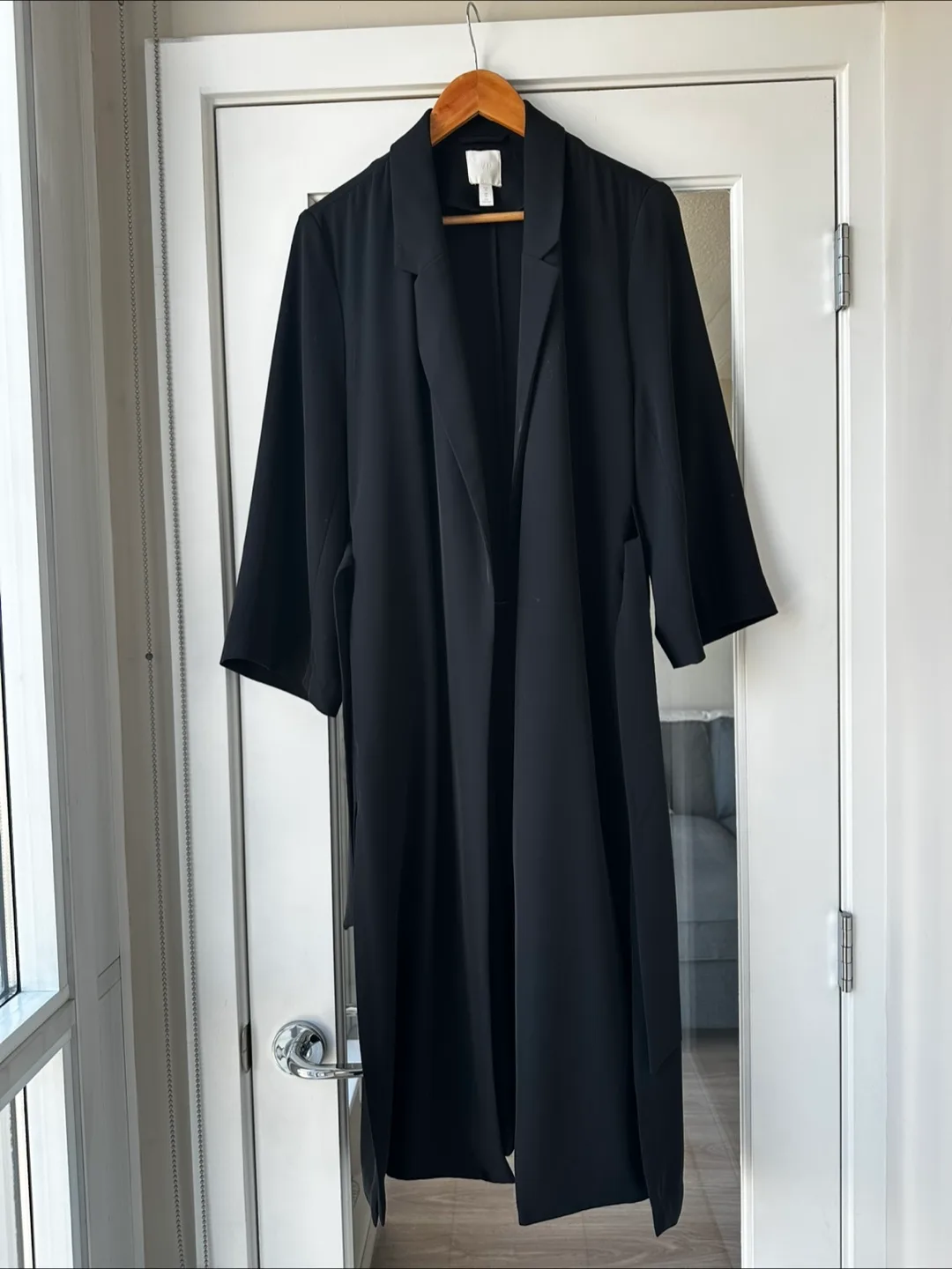 Black long line duster coat thumbnail