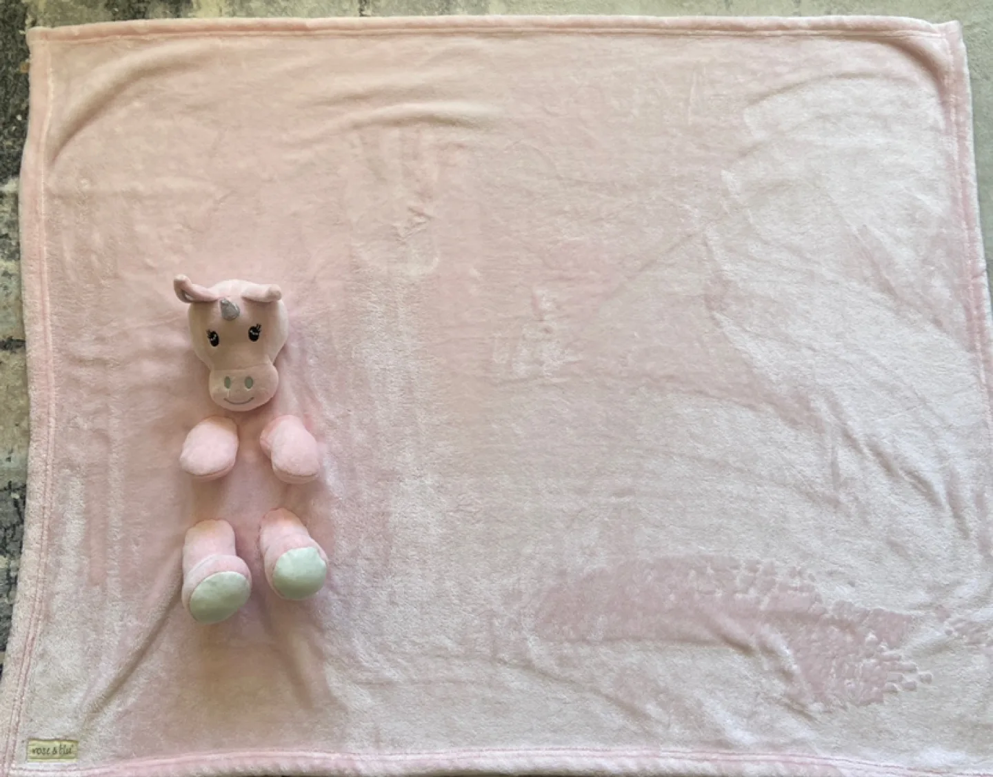 Pink plush blanket with unicorn thumbnail