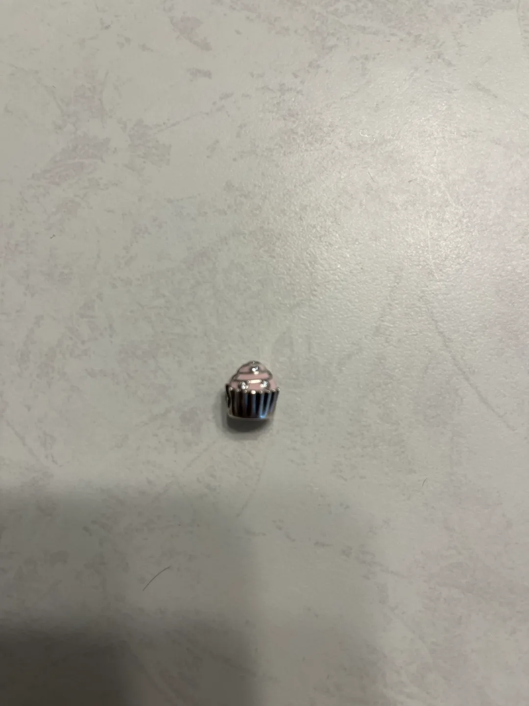 PANDORA Silver cupcake charm with Pink icing thumbnail