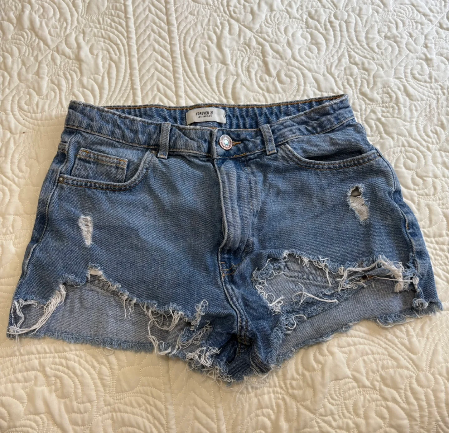 Blue denim shorts thumbnail