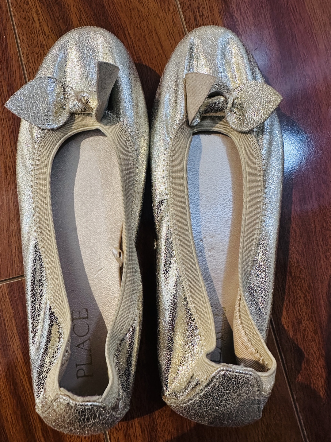 Silver ballet flats with bows