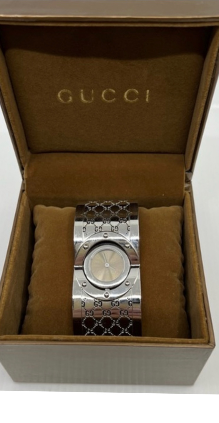 Gucci Women's Watch silver wide bangle style.