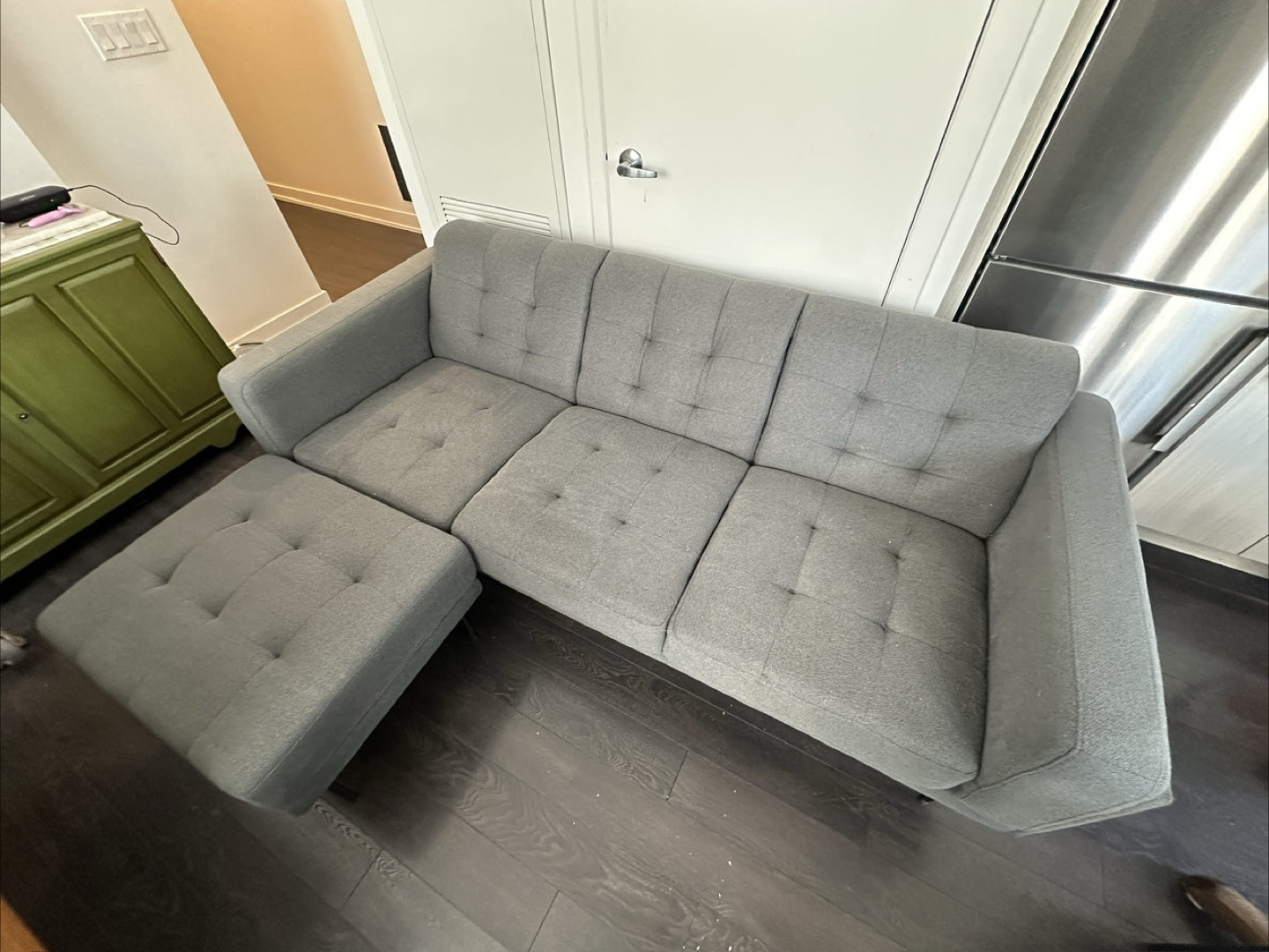 Grey couch and ottoman